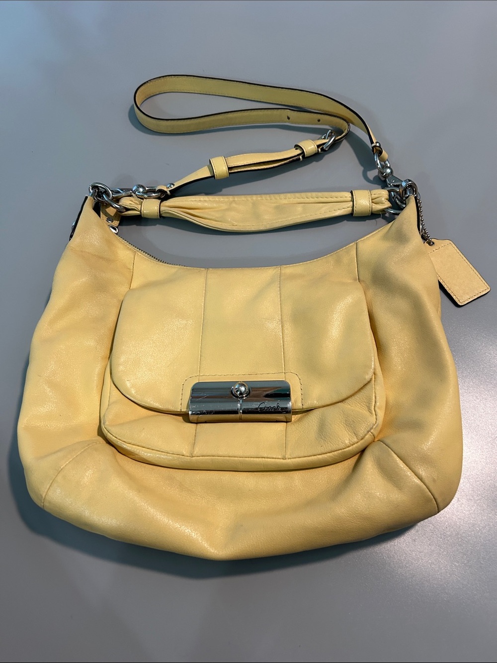Coach Yellow Leather Hobo Bag with Front Pocket and Silver Hardware